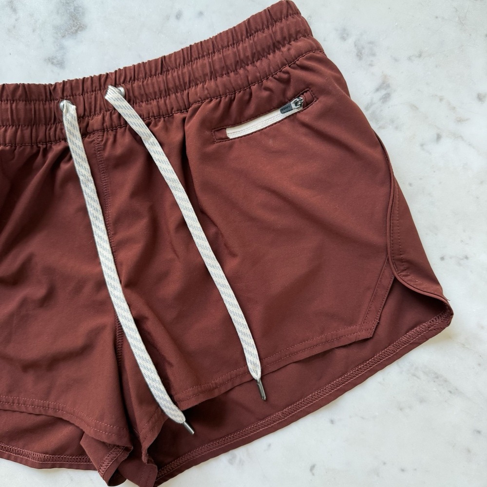 Vuori Women's Athletic Shorts in Rust
